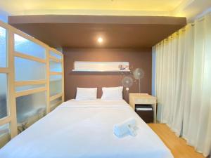 Spacious Studio Room at Gateway Ahmad Yani Cicadas Apartment By Travelio