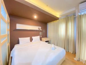 Spacious Studio Room at Gateway Ahmad Yani Cicadas Apartment By Travelio
