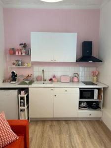 Letage-30m2 au coeur dun immeuble haussmannien