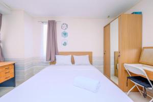 Fully Furnished and Comfy Studio Apartment Margonda Residence 3 By Travelio