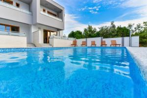 Villa with pool, 50 m from the sandy beach - ID 2209 by Traveler tourist agency Krk