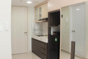 Comfort and Simply Studio Springlake Summarecon Bekasi Apartment By Travelio