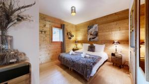 Appartements Pied des Pistes - Evasion alpine haut de gamme : photos des chambres