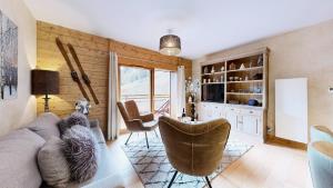 Appartements Pied des Pistes - Evasion alpine haut de gamme : photos des chambres