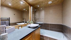 Appartements Pied des Pistes - Evasion alpine haut de gamme : photos des chambres