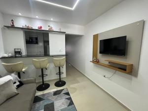 Apartamento 307 à beira mar