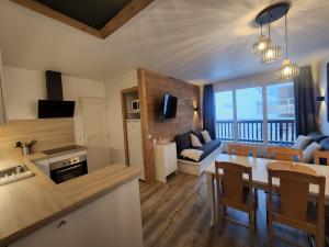 Appartements La Roche Noire - Ski au pied de l'immeuble : photos des chambres