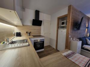 Appartements La Roche Noire - Ski au pied de l'immeuble : photos des chambres