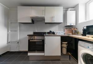Appartements Le Charlot - Appartement design avec parking et terrasse : photos des chambres