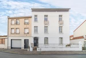 Appartements Le Charlot - Appartement design avec parking et terrasse : photos des chambres