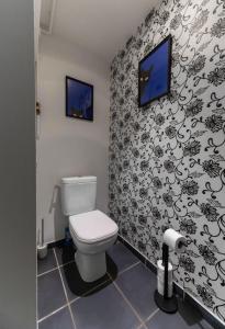 Appartements Le Charlot - Appartement design avec parking et terrasse : photos des chambres