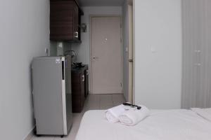 Great Location Studio Room at Patraland Urbano Apartment By Travelio