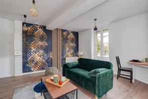 Appartements Cocon de la Place : photos des chambres
