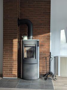 Ferienhaus Hermann mit Garten, Terrasse, Kamin und 300m zum Deich Salzwiesen