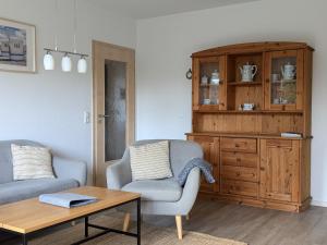 Ferienhaus Hermann mit Garten, Terrasse, Kamin und 300m zum Deich Salzwiesen