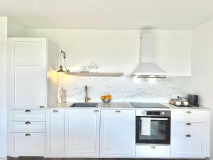 FLAIR Apartments Vorarlberg - Stilvolles Wohnen nahe Bodensee & Alpen - Küche, Balkon & Gratis Parkplatz