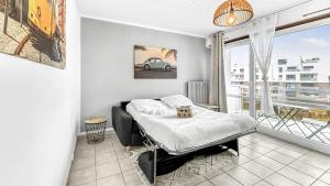 Appartements HOMEY MOSA - Au pied du Tram - Proche centre - Balcon Prive - Wifi et Netflix : photos des chambres