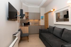 Appartements Au Temps Suspendu : photos des chambres