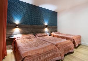 Triple Room room in Hotel Leonard De Vinci