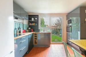 Villas Maison rustique a 11min de Paris, cadre chaleureux : photos des chambres