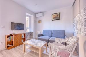 Appartements Le Patio du Port - Appt climatise avec jardin : photos des chambres