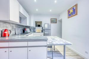 Appartements Le Patio du Port - Appt climatise avec jardin : photos des chambres