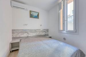 Appartements Le Patio du Port - Appt climatise avec jardin : photos des chambres