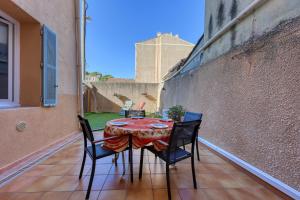 Appartements Le Patio du Port - Appt climatise avec jardin : photos des chambres