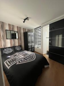Maisons de vacances Gite le Davidson, maison avec jardin : photos des chambres