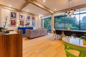 Modern Art Filled Home with Large Living Space and City Views