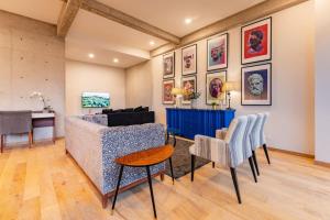 Modern Art Filled Home with Large Living Space and City Views