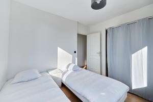 Appartements Appartement Serenite Normande - Welkeys : photos des chambres