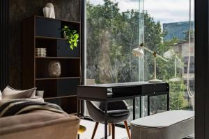 Urban Elegance Apartment with Balcony Views