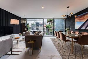 Urban Elegance Apartment with Balcony Views