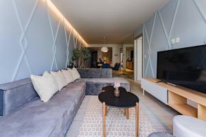 Elegant Apartment with Balcony and City Views