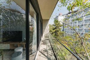 Elegant Apartment with Balcony and City Views