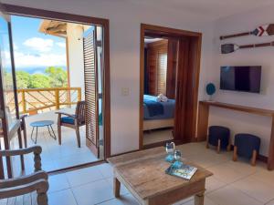 A Casa 46 Ilhabela - Praia do Curral - Refúgio à Beira-Mar, Condominio Yacamim