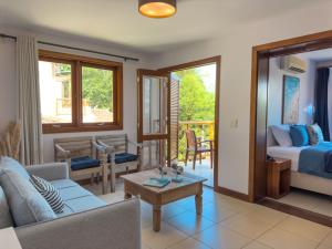 A Casa 46 Ilhabela - Praia do Curral - Refúgio à Beira-Mar, Condominio Yacamim