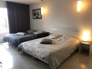 Appartements Family Saint Vincent 4 pers gare lourdes wifi : photos des chambres