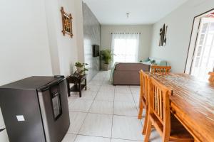 Ótimo sobrado prox da Praia Grande com ar condicionado