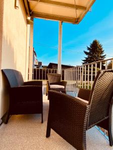 HOCHWERTIGE Ferienwohnung mit 7qm Balkon, Netflix, Kaffeeautomat, RainShower Bad