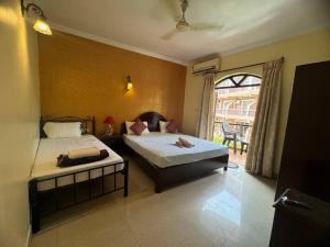 Baga beach Homestay near Titos 311