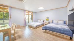 Goseong Gamnamu Pension - 3hvězdičkové hotely ve městě Goseong