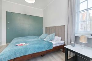 Jasny Apartament z Parkingiem Główne Miasto w Gdańsku by Noclegi Renters