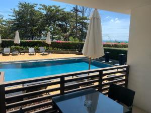 Pool view studio at Nakalay Palm by Lofty