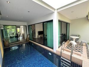 Kamala townhome with sea view terrace & pool