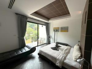 Kamala townhome with sea view terrace & pool