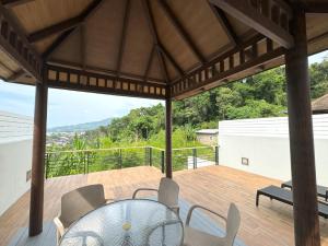 Kamala townhome with sea view terrace & pool