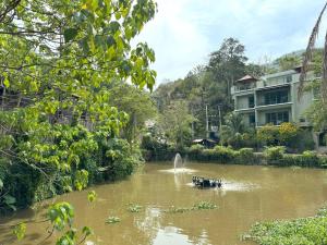 Kamala townhome with sea view terrace & pool