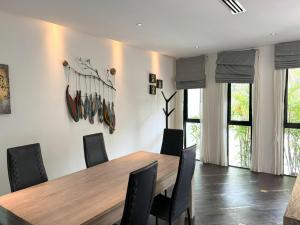 Kamala townhome with sea view terrace & pool